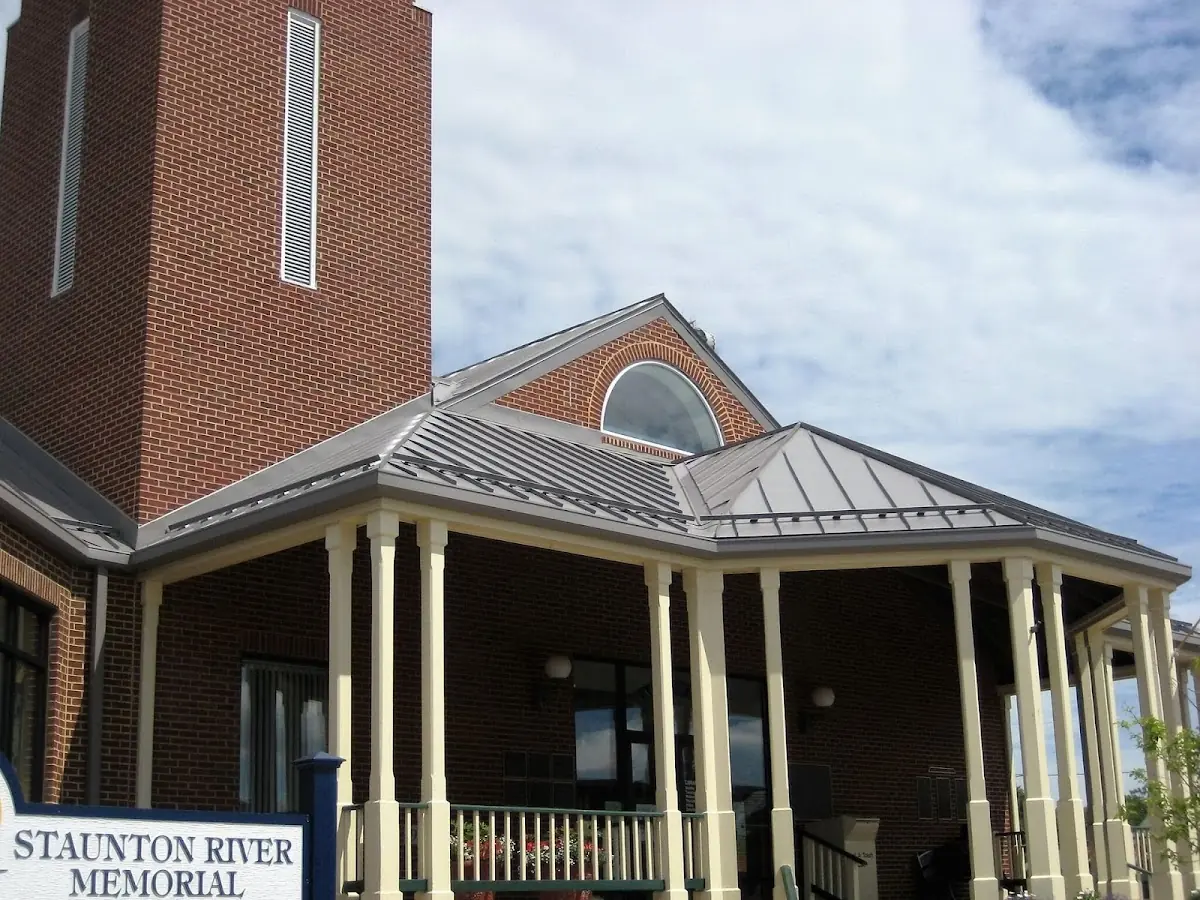 Skilled roofing craftsmen working on a residential roof in Caryville